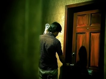 Movie still from “Foo Fighters - Monkey Wrench” (2009), directed by Dave Grohl – Medium shot, High angle