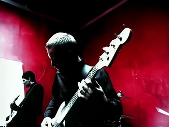 Movie still from “Foo Fighters - Monkey Wrench” (2009), directed by Dave Grohl – Medium shot, Low angle