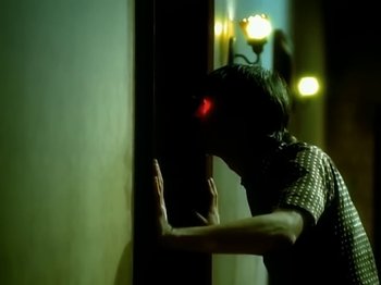 Movie still from “Foo Fighters - Monkey Wrench” (2009), directed by Dave Grohl – Extreme Close Up shot, Over the shoulder angle