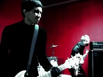 Movie still from “Foo Fighters - Monkey Wrench” (2009), directed by Dave Grohl – Medium shot, Low angle