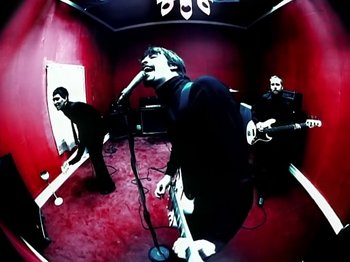 Movie still from “Foo Fighters - Monkey Wrench” (2009), directed by Dave Grohl – Medium shot, Low angle