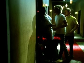 Movie still from “Foo Fighters - Monkey Wrench” (2009), directed by Dave Grohl – Medium shot, Over the shoulder angle