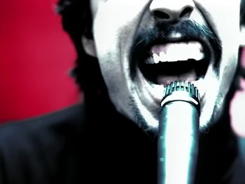 Movie still from “Foo Fighters - Monkey Wrench” (2009), directed by Dave Grohl – Extreme Close Up shot, Overhead angle