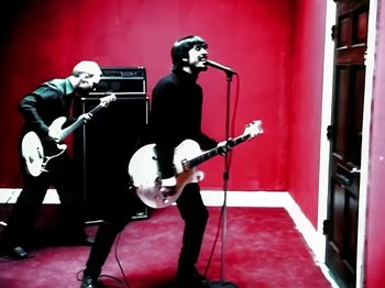 Movie still from “Foo Fighters - Monkey Wrench” (2009), directed by Dave Grohl – Medium shot, Low angle