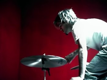 Movie still from “Foo Fighters - Monkey Wrench” (2009), directed by Dave Grohl – Medium shot, Overhead angle