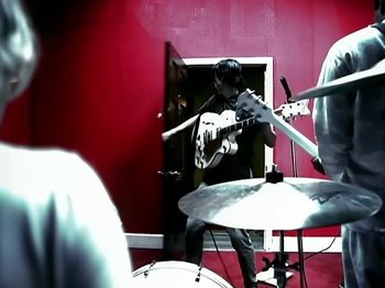 Movie still from “Foo Fighters - Monkey Wrench” (2009), directed by Dave Grohl – Medium shot, High angle
