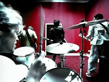 Movie still from “Foo Fighters - Monkey Wrench” (2009), directed by Dave Grohl – Medium shot, High angle