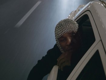 Movie still from “Killdummies - Keine War Großartig//Fukk U” (2023), directed by Tom Klimek – Close Up shot, Low angle