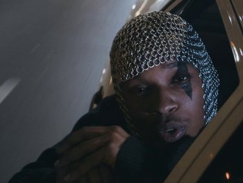 Movie still from “Killdummies - Keine War Großartig//Fukk U” (2023), directed by Tom Klimek – Close Up shot, High angle