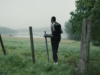 Movie still from “Killdummies - Keine War Großartig//Fukk U” (2023), directed by Tom Klimek – Wide shot, Low angle