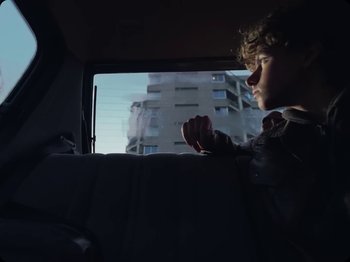 Movie still from “Mula B - Blokke Gepikt” (2024), directed by Folkert Verdoorn – Close Up shot, Low angle