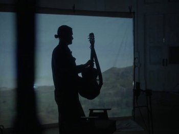 Movie still from “Hayden Thorpe - Aerial Songs” (2021), directed by Fiona Jane Burgess – Wide shot, Low angle