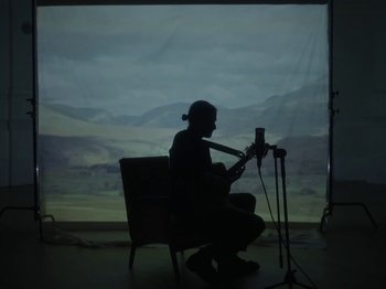 Movie still from “Hayden Thorpe - Aerial Songs” (2021), directed by Fiona Jane Burgess – Wide shot, Low angle