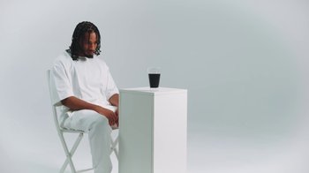 Movie still from “Armani White - BILLIE EILISH.” (2022), directed by Davey Robinson – Medium shot, Over the shoulder angle