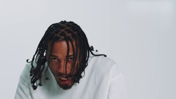 Movie still from “Armani White - BILLIE EILISH.” (2022), directed by Davey Robinson – Close Up shot, Low angle