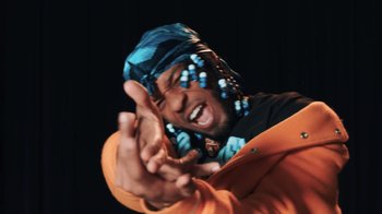 Movie still from “Armani White - BILLIE EILISH.” (2022), directed by Davey Robinson – Close Up shot, Low angle