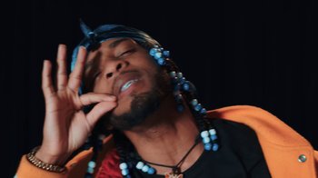 Movie still from “Armani White - BILLIE EILISH.” (2022), directed by Davey Robinson – Close Up shot, Low angle