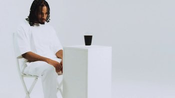 Movie still from “Armani White - BILLIE EILISH.” (2022), directed by Davey Robinson – Medium shot, Low angle