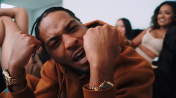 Movie still from “Armani White - BILLIE EILISH.” (2022), directed by Davey Robinson – Close Up shot, Low angle