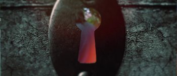 Movie still from “Elliot James Mulhern - How's It Gonna Stop?” (2020), directed by Joseph Michael Mercado – Extreme Close Up shot, High angle