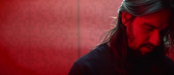 Movie still from “Elliot James Mulhern - How's It Gonna Stop?” (2020), directed by Joseph Michael Mercado – Close Up shot, Low angle