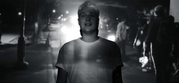 Movie still from “The Bar Stool Preachers - Lighthouse Keeper” (2023), created by Ben Hannah – Medium shot, Low angle