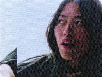 Movie still from “Deb Never - Momentary Sweetheart” (2023), directed by UNCANNY – Extreme Close Up shot, Low angle