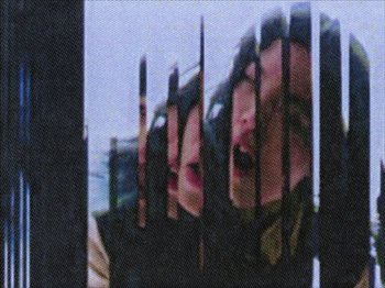 Movie still from “Deb Never - Momentary Sweetheart” (2023), directed by UNCANNY – Extreme Close Up shot, Low angle