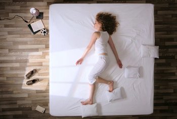 Movie still from “Oren Lavie - Her Morning Elegance” (2009), directed by Oren Lavie – Wide shot, Overhead angle