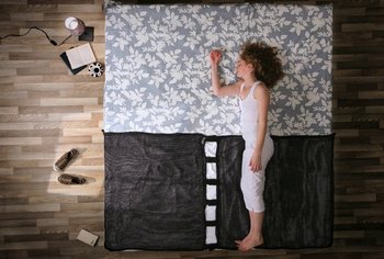 Movie still from “Oren Lavie - Her Morning Elegance” (2009), directed by Oren Lavie – Wide shot, Overhead angle