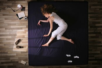 Movie still from “Oren Lavie - Her Morning Elegance” (2009), directed by Oren Lavie – Wide shot, Overhead angle