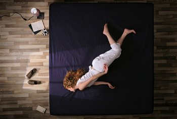 Movie still from “Oren Lavie - Her Morning Elegance” (2009), directed by Oren Lavie – Wide shot, Overhead angle