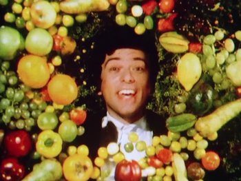 Movie still from “Peter Gabriel - Sledgehammer” (1986), directed by Stephen R. Johnson – Medium shot, Overhead angle