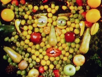 Movie still from “Peter Gabriel - Sledgehammer” (1986), directed by Stephen R. Johnson – Extreme Close Up shot, Overhead angle