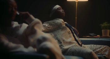 Movie still from “Marzz - Countless Times” (2021), directed by dayday – Medium shot, Low angle