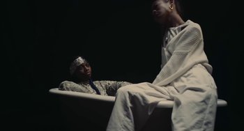 Movie still from “Marzz - Countless Times” (2021), directed by dayday – Medium shot, Low angle