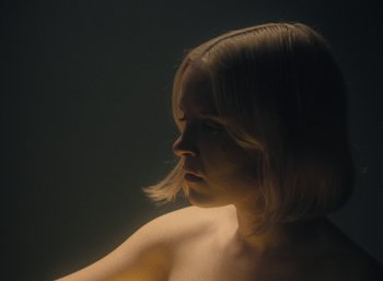 Movie still from “Carlota Flâneur - See You Again” (2021), directed by Carles Pons Altimira – Extreme Close Up shot, High angle