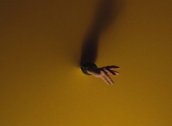 Movie still from “Carlota Flâneur - See You Again” (2021), directed by Carles Pons Altimira – Extreme Close Up shot, Overhead angle