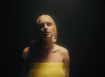 Movie still from “Carlota Flâneur - See You Again” (2021), directed by Carles Pons Altimira – Medium shot, Low angle