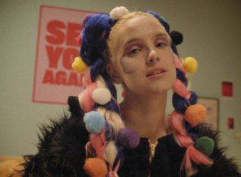 Movie still from “Carlota Flâneur - See You Again” (2021), directed by Carles Pons Altimira – Close Up shot, Over the shoulder angle