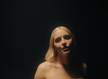 Movie still from “Carlota Flâneur - See You Again” (2021), directed by Carles Pons Altimira – Close Up shot, Low angle