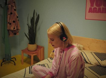 Movie still from “Carlota Flâneur - See You Again” (2021), directed by Carles Pons Altimira – Medium shot, High angle