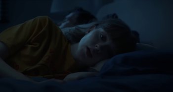 Movie still from “Maisie Peters - Psycho” (2021), directed by LOUIS BHOSE – Medium shot, High angle