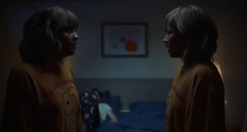 Movie still from “Maisie Peters - Psycho” (2021), directed by LOUIS BHOSE – Medium shot, Over the shoulder angle