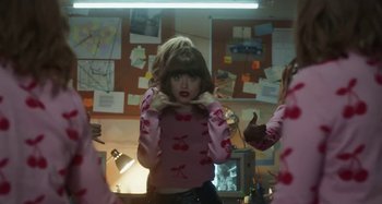 Movie still from “Maisie Peters - Psycho” (2021), directed by LOUIS BHOSE – Medium shot, Over the shoulder angle