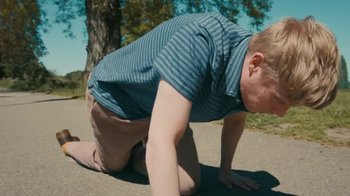 Movie still from “Welshy - All for You” (2021), directed by Arthur Studholme – Medium shot, High angle