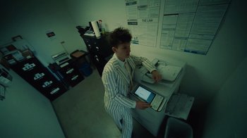 Movie still from “Gus Dapperton - Palms feat. Channel Tres” (2021), directed by Kevin Lombardo – Medium shot, High angle