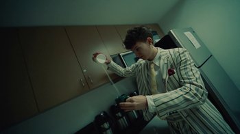Movie still from “Gus Dapperton - Palms feat. Channel Tres” (2021), directed by Kevin Lombardo – Medium shot, High angle