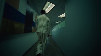 Movie still from “Gus Dapperton - Palms feat. Channel Tres” (2021), directed by Kevin Lombardo – Wide shot, Low angle