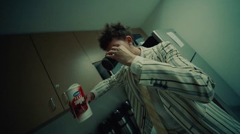 Movie still from “Gus Dapperton - Palms feat. Channel Tres” (2021), directed by Kevin Lombardo – Medium shot, High angle